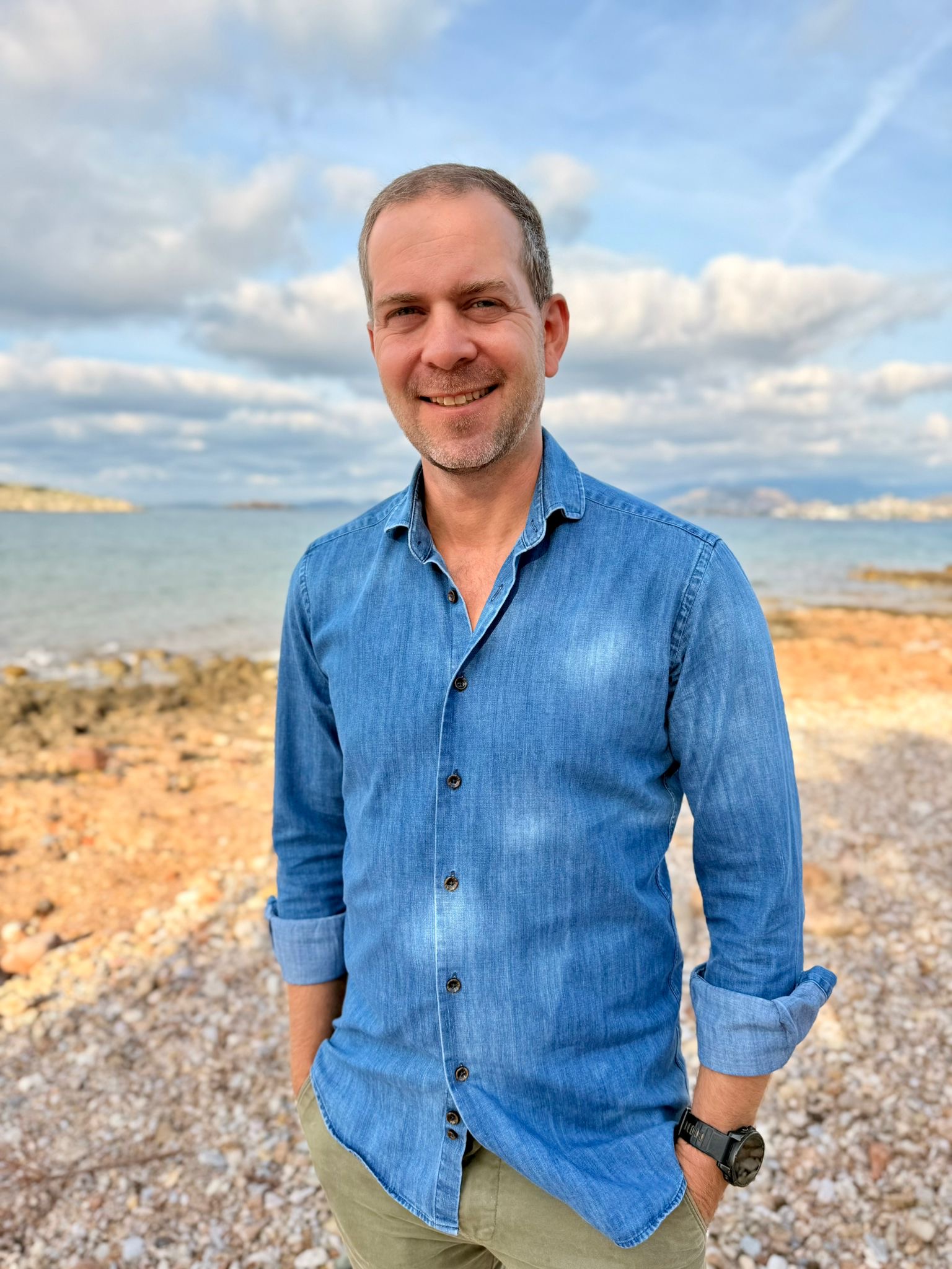 Kevin Van Boven walking along the Athens Riviera, inspiration for Athens Riviera Retreats and his writing.