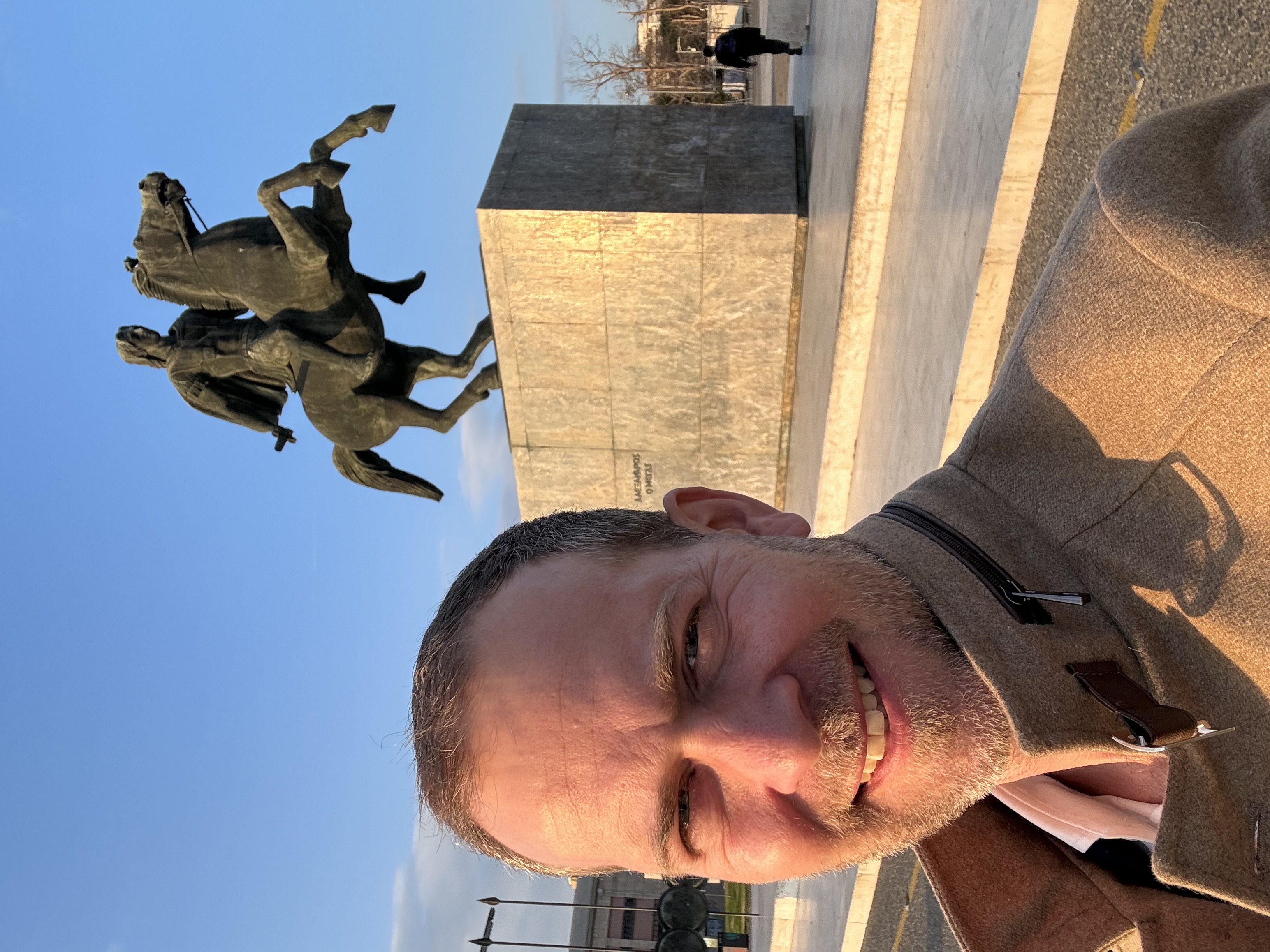 Relaxed portrait of Kevin Van Boven on the Athens Riviera coastline.